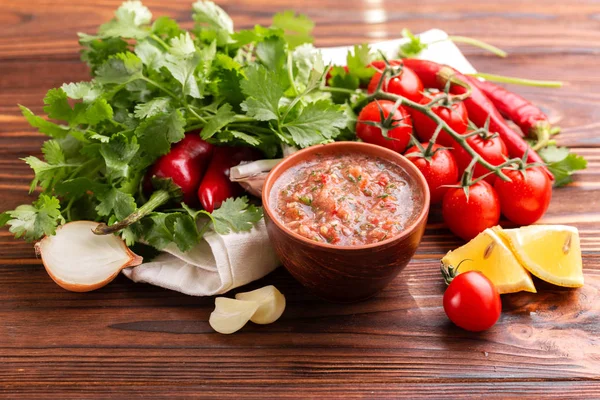 Traditional mexican red spicy sauce salsa with ingredients — Stock Photo, Image