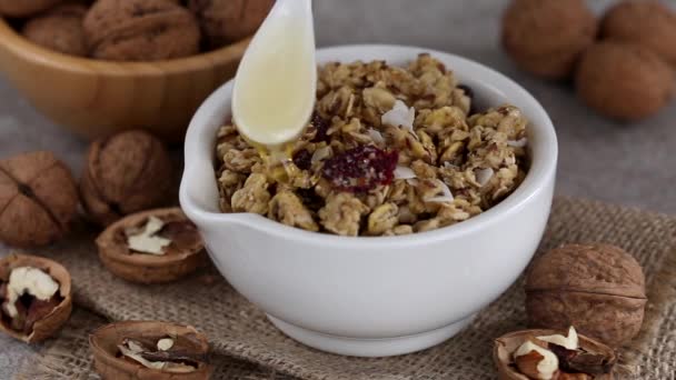 Bowl Homemade Granola Nuts Raisins Grey Slate Background Horizontal View — Stock Video