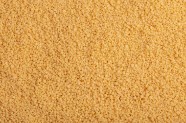 Sarı ham kuskus tahıl arka plan. Yakın çekim. Üstten görünüm