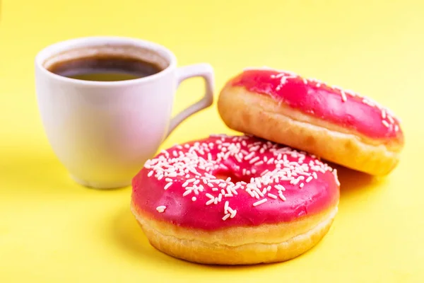 Two Delicious Pink Donuts Sprinkle Cup Coffee Bright Yellow Background — Stock Photo, Image