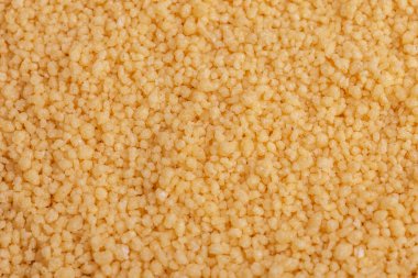 Sarı ham kuskus tahıl arka plan. Yakın çekim. Üstten görünüm