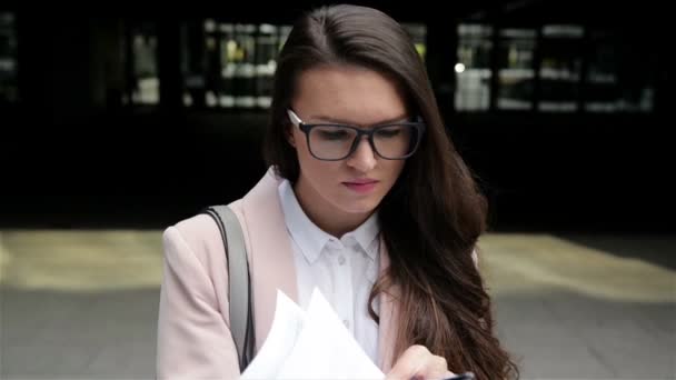 Young Successful Businesswoman or Female Student Holding Documents Outdoors. Professional Female Receiving Good News Excited Happy Cheerful Smiling. Success and Achievement Concept. — Stock Video