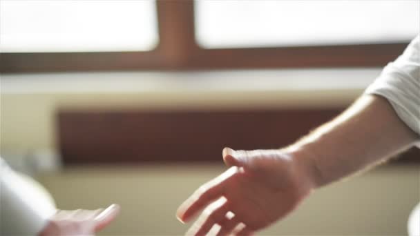 Companionship Hand Clasping Success Trust, Confident Concept. or Closeup of a Businessman Hand Between Two Colleagues in the office. — Stock Video