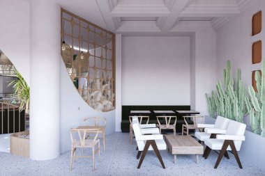 Beyaz tuğlalı, içi kanepeli bir restoran.