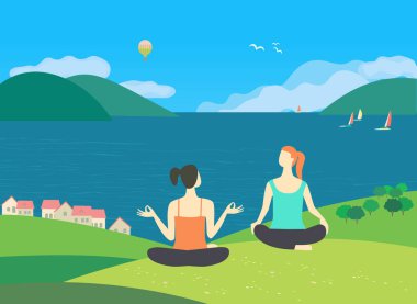 Doğa üzerinde kızlar eğitim yoga