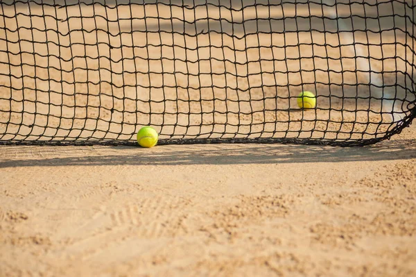 A tennis net and ball. Sport concept. Select focus