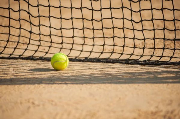 A tennis net and ball. Sport concept. Select focus