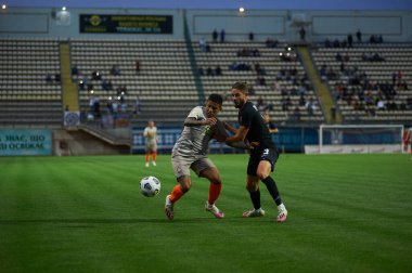 ZAPORIZHZHYA, UKRAINE - SEPTEMBER 20, 2020: Dodo ve Maksim Grechkin futbol karşılaşması sırasında Ukrayna Premiere Ligi Zorya Luhansk - FC Shakhtar Donetsk