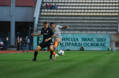 ZAPORIZHZHYA, UKRAINE - 20 Eylül 2020: Dodo - Artem Gromov futbol karşılaşması sırasında Ukrayna Premiere Ligi Zorya Luhansk - FC Shakhtar Donetsk