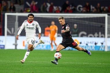 LEVERKUSEN, GERMANY - 12 EPTEMBER, 2025: Alejandro Grimaldo, Mo Dahoud - Bundesliga maçı Bayer 04 Leverkusen-SG Eintracht Frankfurt. 