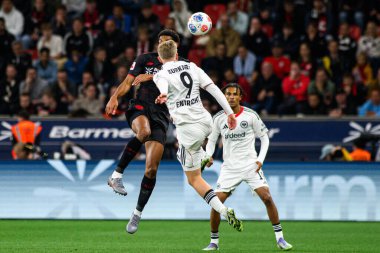 LEVERKUSEN, GERMANY - 12 SEPTEMBER, 2025: Jarell Quansah, Jonathan Burkardt - Bundesliga maçı Bayer 04 Leverkusen-SG Eintracht Frankfurt - Bayena 'da. 