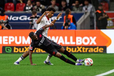 LEVERKUSEN, GERMANY - 12 EYLÜL 2025: Nathan Tella - Bayer 04 Leverkusen-SG Eintracht Frankfurt maçı Bayena 'da. 