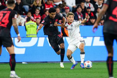 LEVERKUSEN, GERMANY - 12 SEPTEMBER, 2025: Malik Tillman, Ritsu Doan - Bayer 04 Leverkusen-SG Eintracht Frankfurt maçında Bundesliga maçı. 