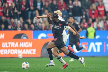 LEVERKUSEN, GERMANY - 12 SEPTEMBER, 2025: Nathan Tella, Oscar Hojlund - Bundesliga maçı Bayer 04 Leverkusen vs SG Eintracht Frankfurt at Bayena. 