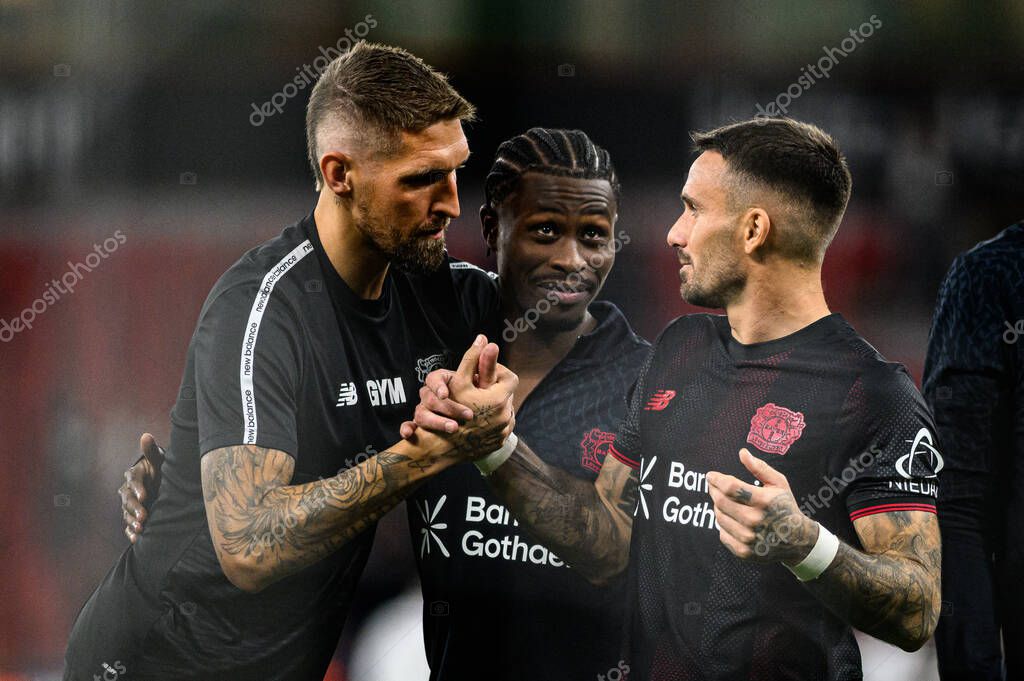 LEVERKUSEN, GERMANY - 12 SEPTEMBER, 2025: Robert Andrich, Nathan Tella, Aleix Garcia - The Bundesliga match Bayer 04 Leverkusen vs SG Eintracht Frankfurt at BayArena.