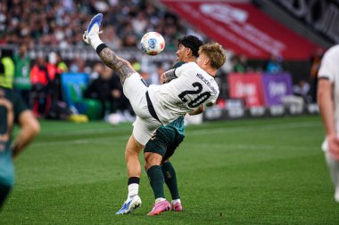 MOENCHENGLADBACH, GERMANY - 14 Eylül 2025: Luca Netz, Cameron Puertas - Bundesliga Borussia Moenchengladbach-SV Werder Bremen maçı Borussia Park 'ta.