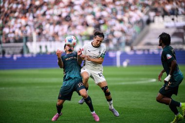 MOENCHENGLADBACH, GERMANY - 14 Eylül 2025: Cameron Puertas, Rocco Reitz - Bundesliga Borussia Moenchengladbach-SV Werder Bremen maçı Borussia Park 'ta.