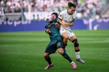 MOENCHENGLADBACH, GERMANY - 14 Eylül 2025: Cameron Puertas, Rocco Reitz - Bundesliga Borussia Moenchengladbach-SV Werder Bremen maçı Borussia Park 'ta.