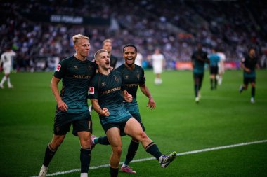 MOENCHENGLADBACH, GERMANY - 14 Eylül 2025: Marco Grull, Romano Schmid, Justin Njinmah - Bundesliga Borussia Moenchengladbach-SV Werder Bremen maçı Borussia Park 'ta.