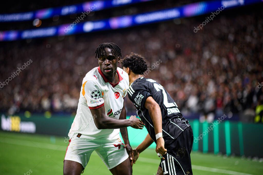 FRANKFURT, GERMANY - 18 SEPTEMBER, 2025: Wilfried Singo, Nathaniel Brown - The match UEFA Champions League Eintracht Frankfurt v Galatasaray A.S. at Deutsche Bank Park.