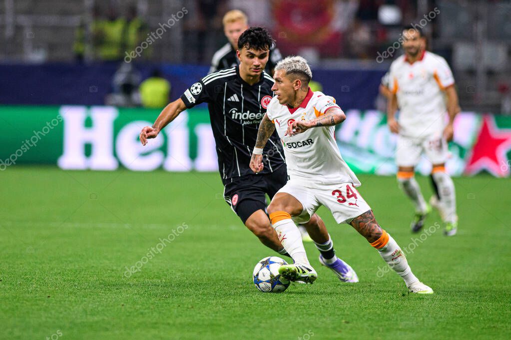 FRANKFURT, GERMANY - 18 SEPTEMBER, 2025: Lucas Torreira, Can Uzun - The match UEFA Champions League Eintracht Frankfurt v Galatasaray A.S. at Deutsche Bank Park.