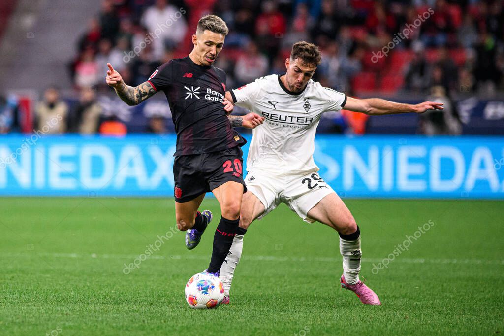 LEVERKUSEN, GERMANY - 21 SEPTEMBER, 2025: Alejandro Grimaldo, Joe Scally - The Bundesliga match Bayer 04 Leverkusen vs Borussia Moenchengladbach at BayArena.
