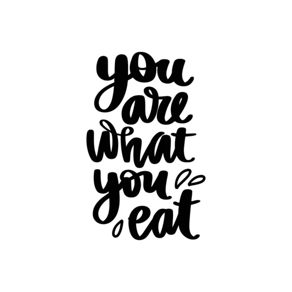 Tu és o que comes. Vector mão desenhada lettering citação sobre alimentos saudáveis . —  Vetores de Stock