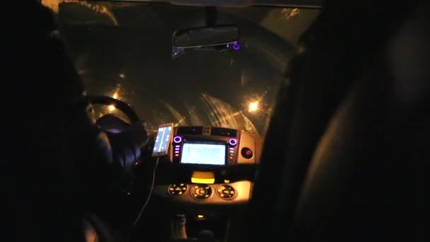 Night driving tunnel lights woman hand on steering wheel — Stock Video