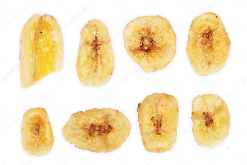 Baked and dried banana chip slice isolated over the white background, set of different foreshortenings