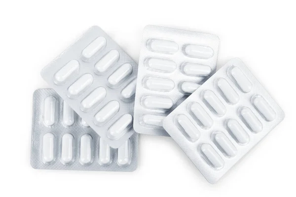 Tabletták Fólia Fehér Alapon — Stock Fotó
