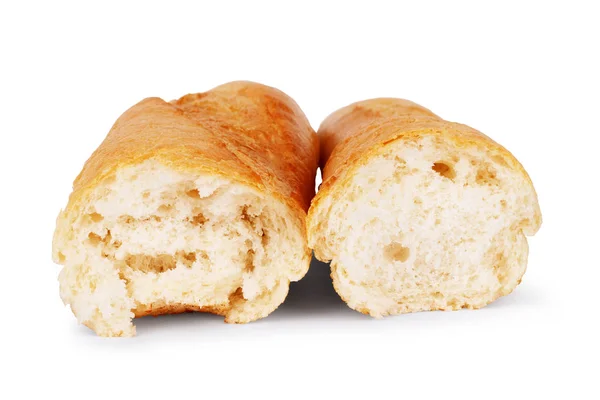 Bagietka chleb jest dzielony na pół na białym tle — Zdjęcie stockowe