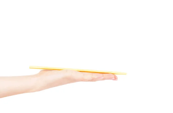 Sushi bâtons asiatique dans la main féminine sur un fond blanc — Photo