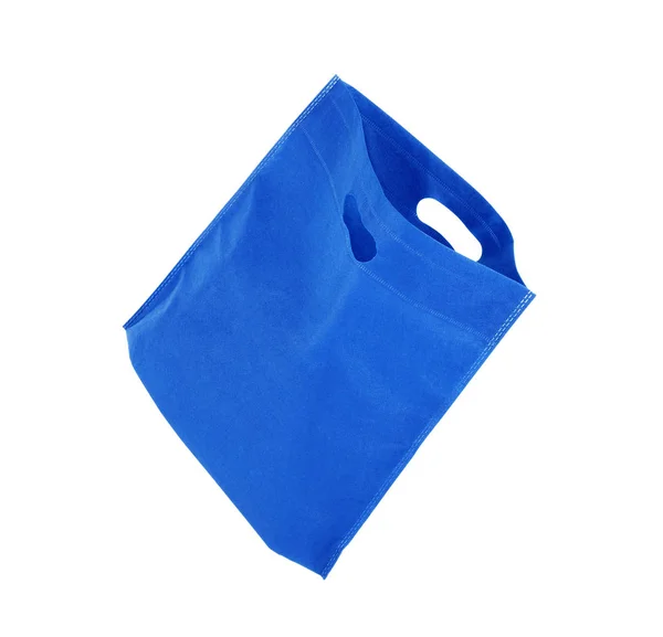 Saco de compras azul reutilizável em um fundo branco — Fotografia de Stock