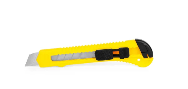 A faca de papelaria amarela isolada no fundo branco — Fotografia de Stock