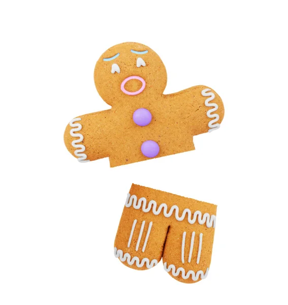 Trasiga pepparkaksgubbe på vit bakgrund — Stockfoto