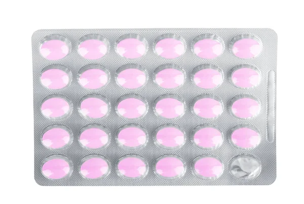Tabletták egy tabletta palack fehér háttér — Stock Fotó
