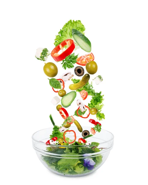 Salad of greens, cheese and radish on an isolated white backgrou Stock Picture