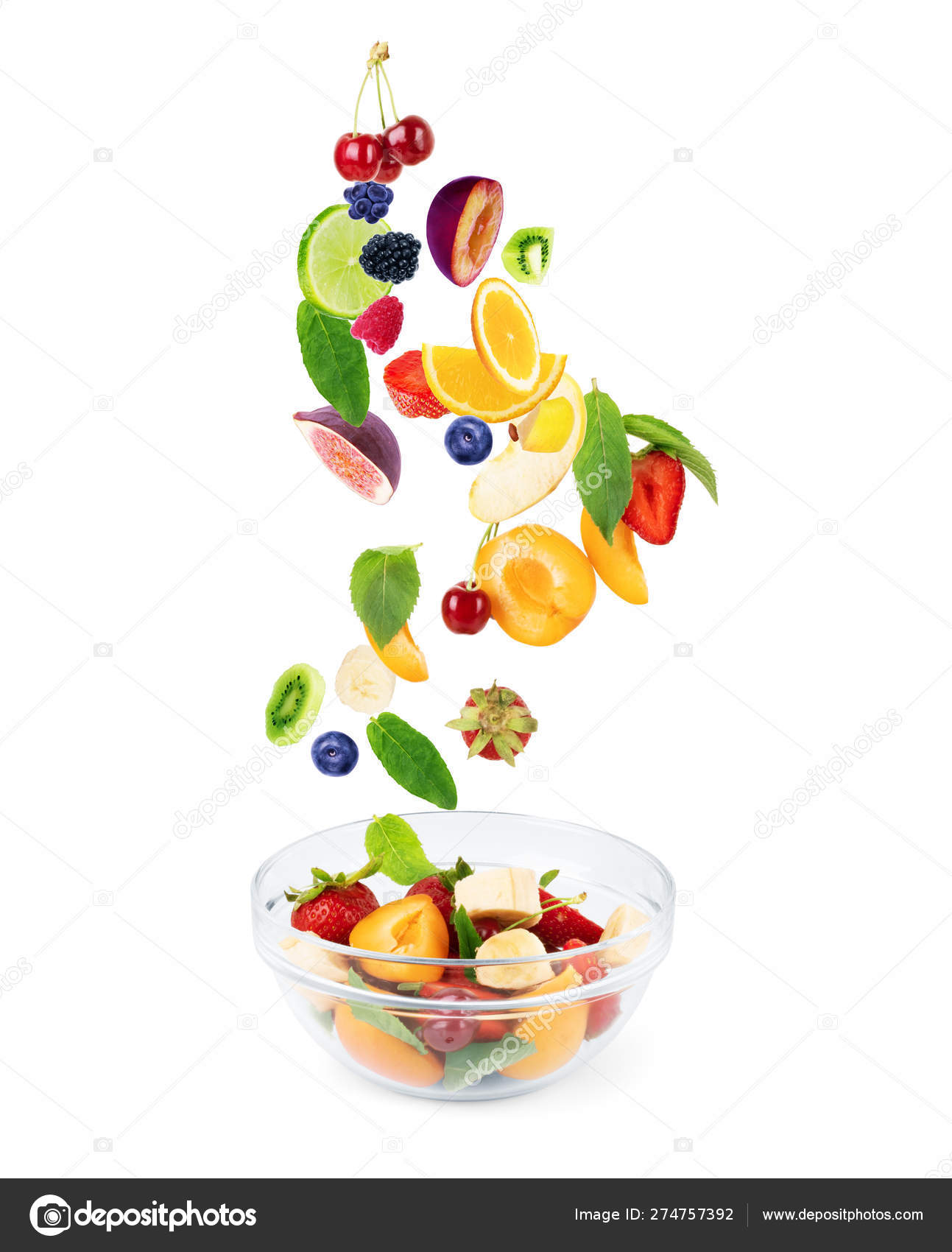 Different fruits, in flight fly into a plate with fruit, on a wh Stock Photo by 274757392