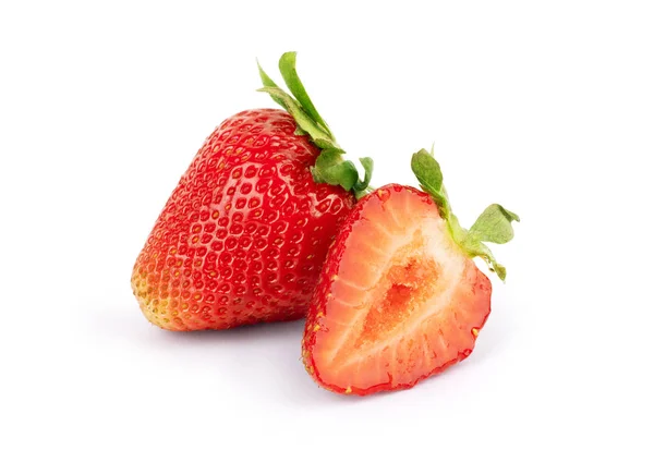 Whole and half strawberries on a white background — ストック写真