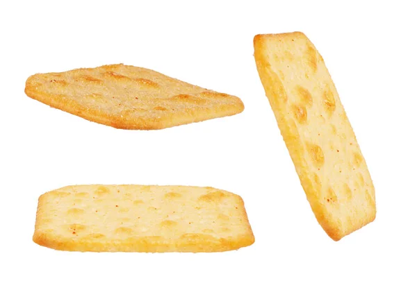 Set di cracker salati su sfondo bianco — Foto Stock