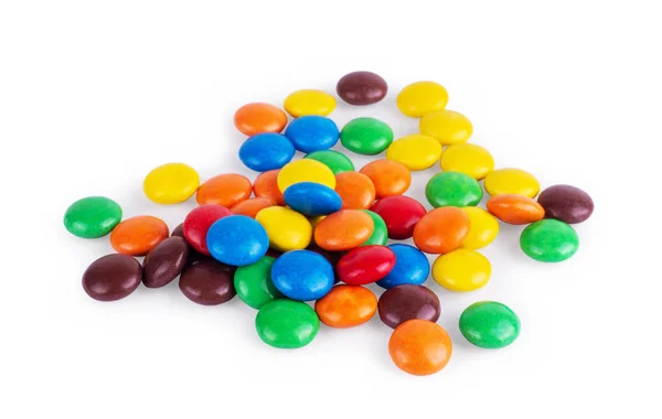 Круглые разноцветные сладости на белом фоне — стоковое фото