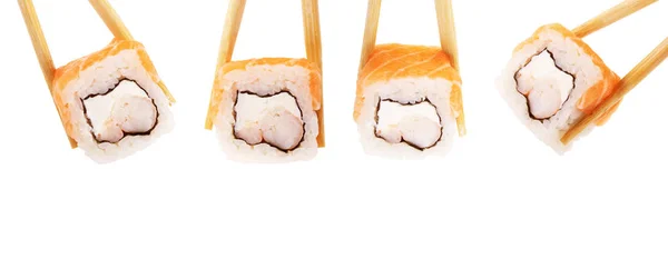 Ensemble de sushis avec baguettes sur fond blanc — Photo