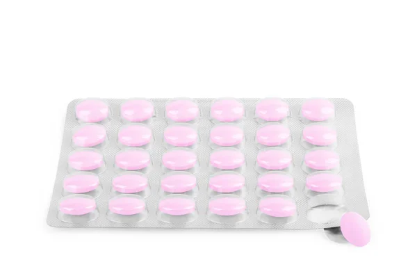 Tablettát egy buborékfóliában, fehér alapon — Stock Fotó