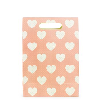 Fiyonklu boş, beyaz bir hediye çantası. Beyaz arka planda izole edilmiş. Boş plastik ambalaj tezgahı. Tüketici paketi logo tasarımı veya kimlik sunumu için hazır.