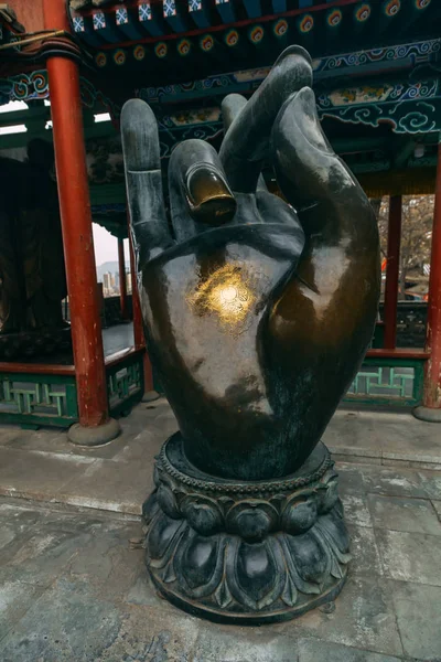 Buddha statues hand in chinese mountain park