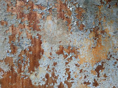 Aşınmış metal zemin. Paslı metal arka planda pas izleri var. Pas lekeleri. Rystycorrosion.