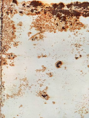 Aşınmış metal zemin. Paslı boyanmış metal duvar. Paslı metal arka planda pas izleri var. Pas lekeleri. Metal yüzey paslanmış lekeler. Rystycorrosion.