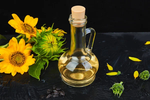 Sunflower Oil Glass Jar Sunflower Seeds Fresh Flowers Black Table — Stock Photo, Image