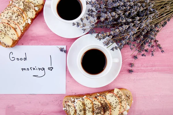 Two cups of coffee  with bouquet of flowers lavender — Stock Photo, Image