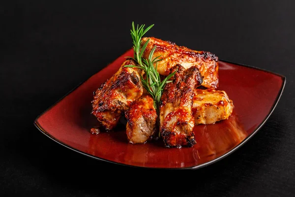 Concept American Cuisine Glazed Pork Ribs Barbecue Rosemary Red Plate — Stock Photo, Image